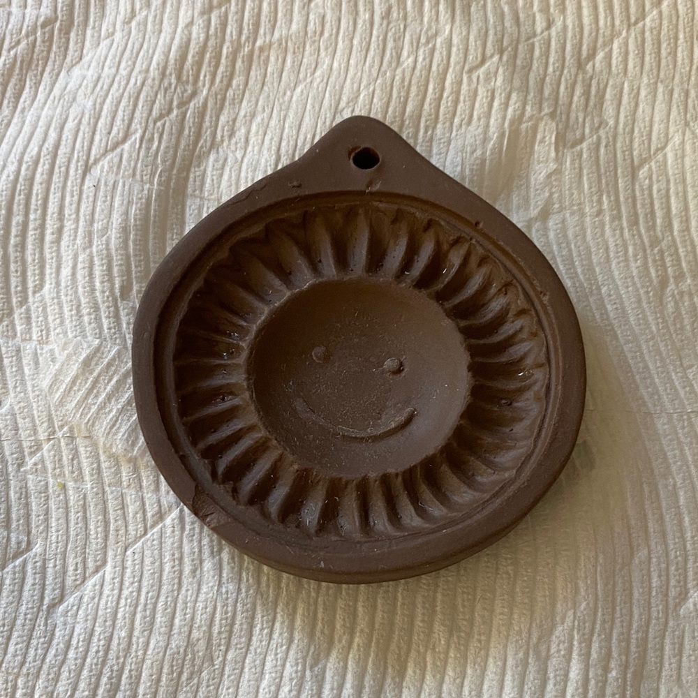 Brown Sunburst Wall Hanging or cookie mold
